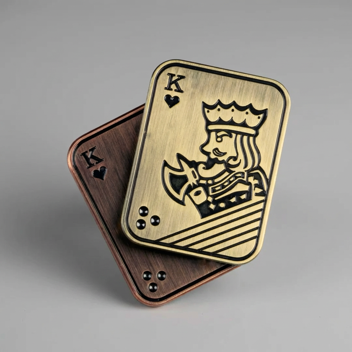 Close-up of the antique bronze Phantom Ace slider showing its dual-layer magnetic haptic structure and tactical aesthetic