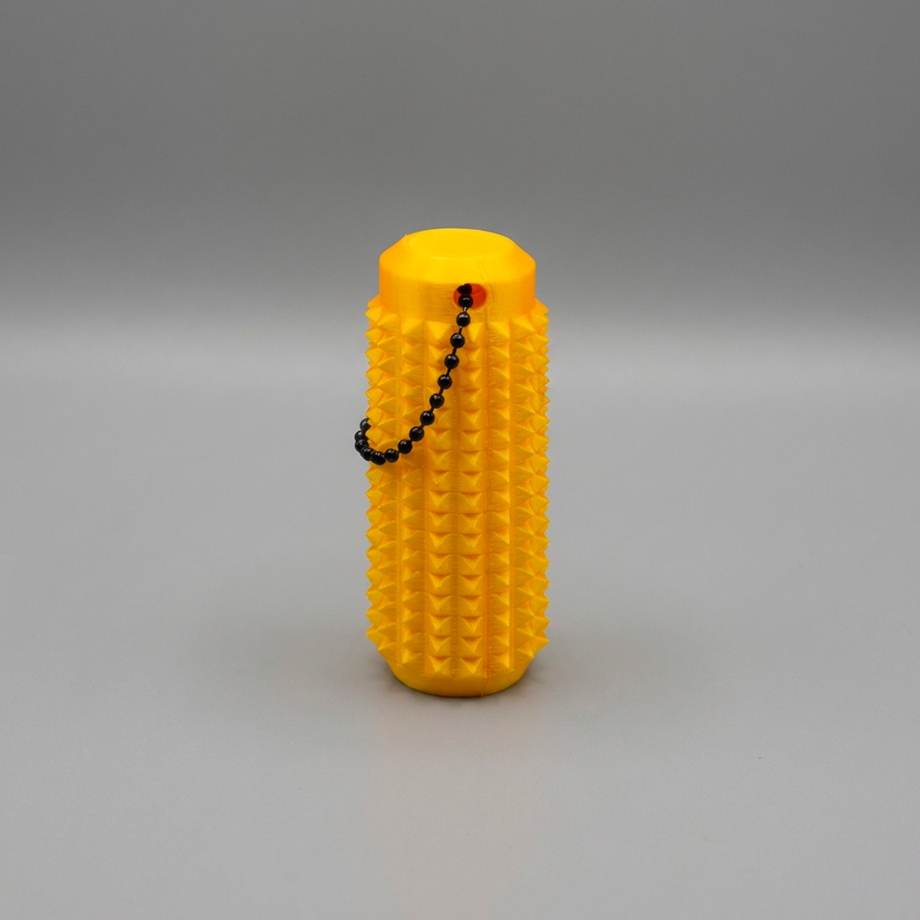 Sunshine Yellow Spiked Core haptic roller - Durable and lightweight sensory gear by Lumenly